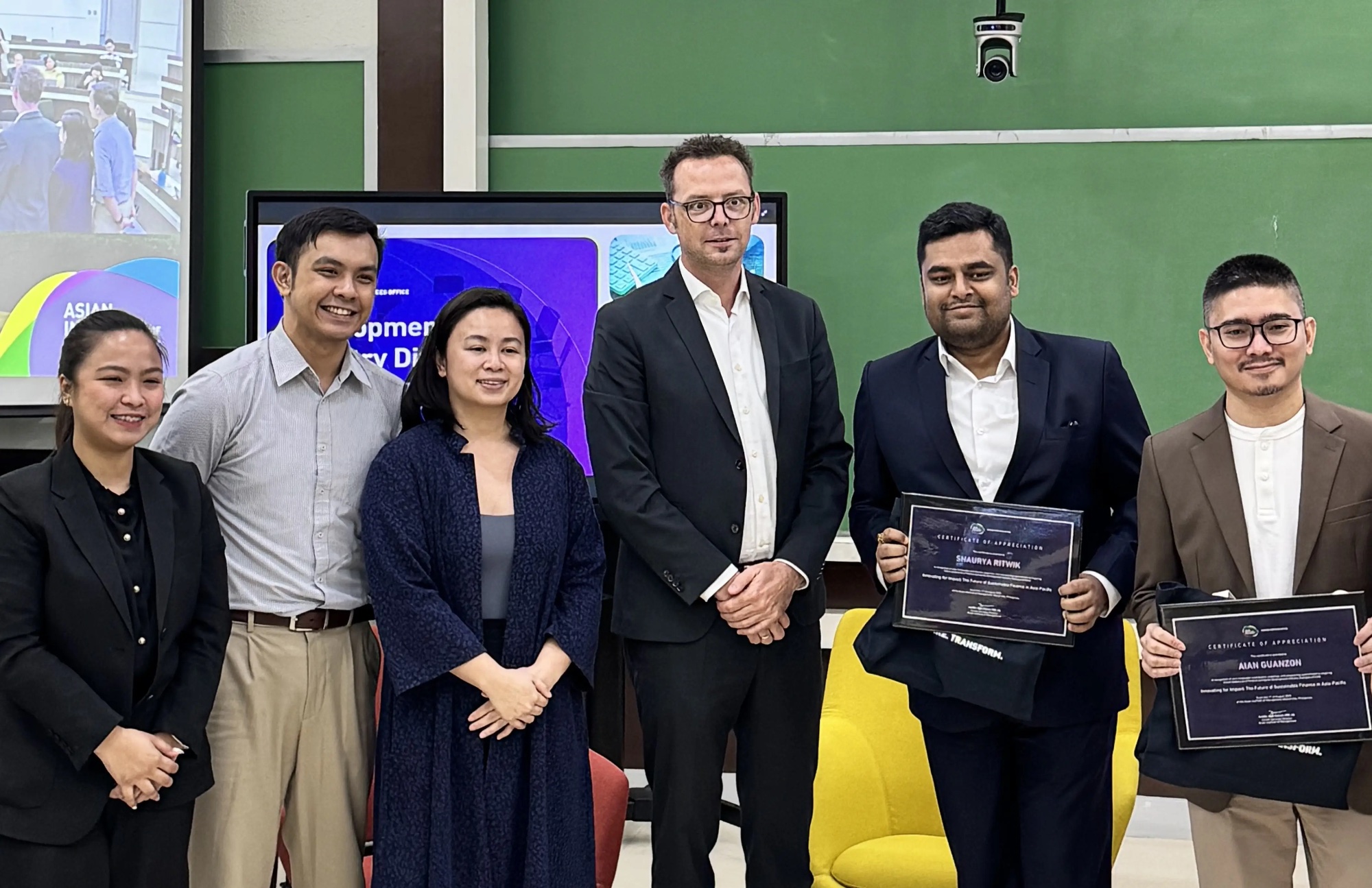 Group photo with speakers at AIM Development Industry Dialogue
