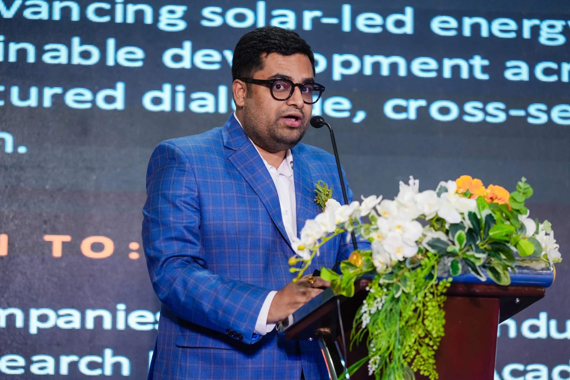 Shaurya Ritwik on stage at ASEAN Energy Summit Bangkok 2026 — name projected on screen